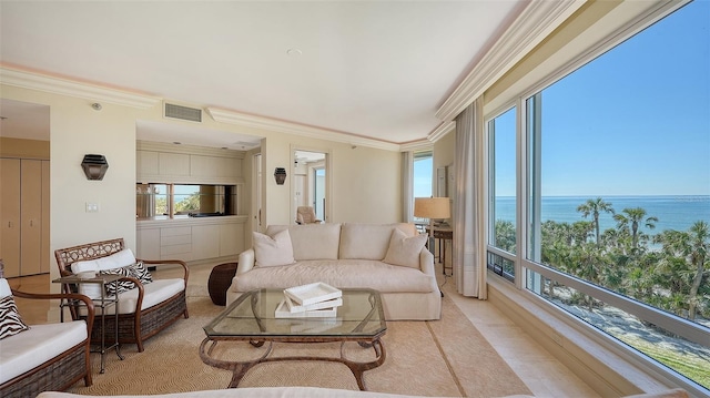 living room with crown molding, a water view, and light tile patterned flooring