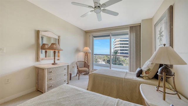 bedroom with ceiling fan, light colored carpet, and access to exterior