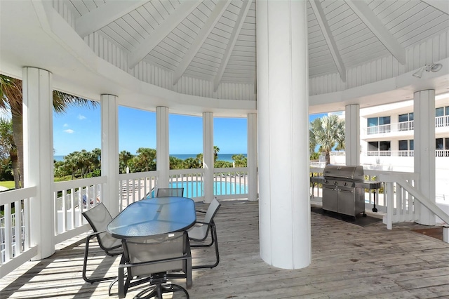 wooden deck featuring area for grilling and a gazebo