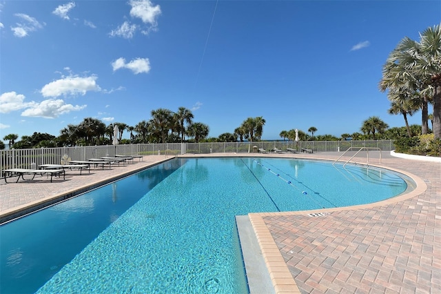 view of pool featuring a patio area