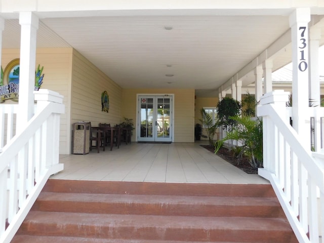 doorway to property featuring french doors