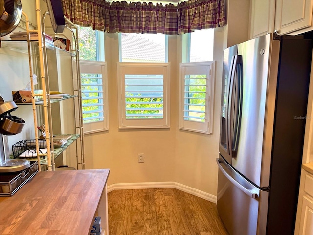 interior space featuring light hardwood / wood-style floors and a wealth of natural light