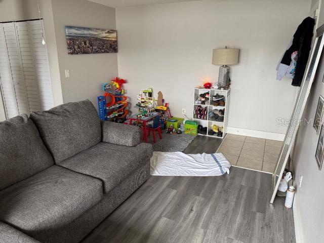 living room with wood-type flooring