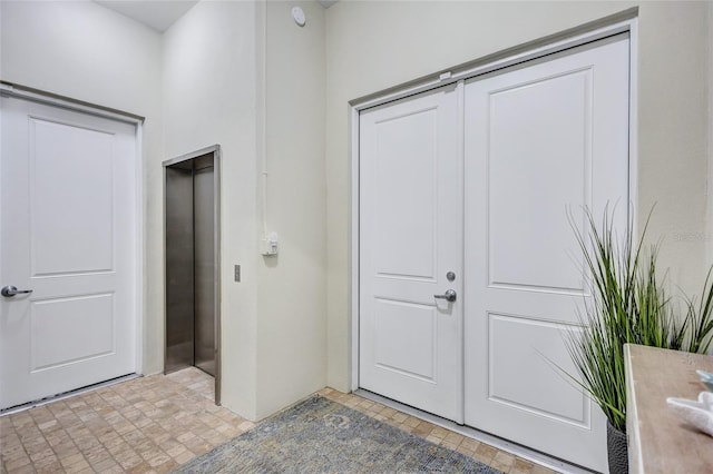 entryway featuring elevator