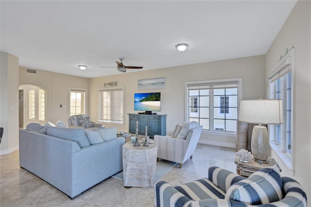 living room featuring ceiling fan