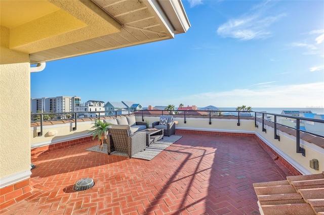 view of patio with outdoor lounge area and a balcony