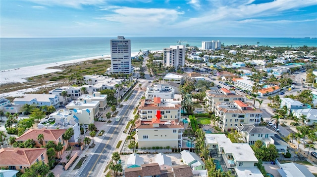 aerial view with a view of the beach and a water view