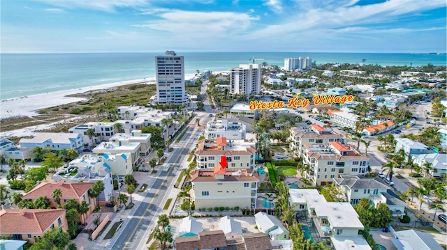 bird's eye view with a view of the beach and a water view