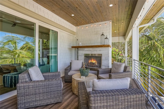 exterior space with an outdoor stone fireplace