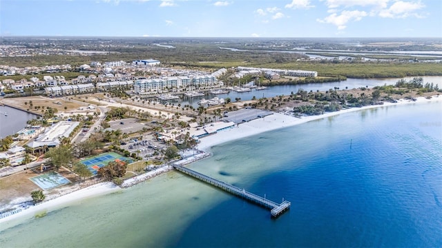 birds eye view of property featuring a water view and a view of the beach