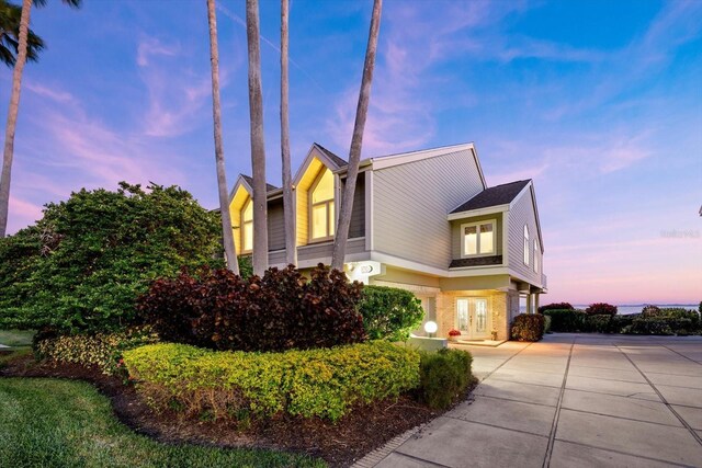 view of property exterior at dusk