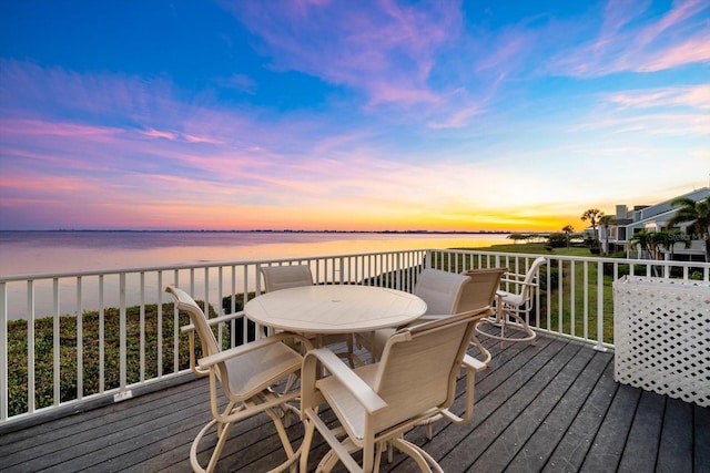 deck at dusk with a water view