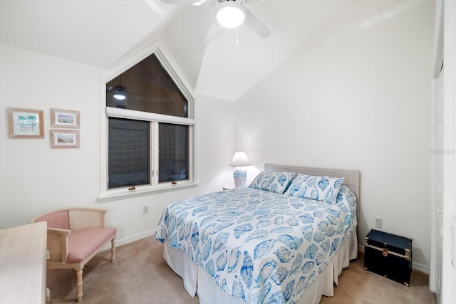 carpeted bedroom with ceiling fan and lofted ceiling