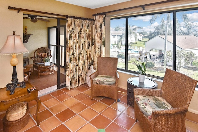 sitting room with tile patterned floors