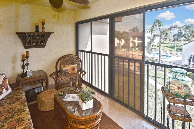 balcony featuring ceiling fan