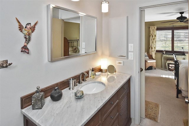 bathroom featuring vanity and ceiling fan