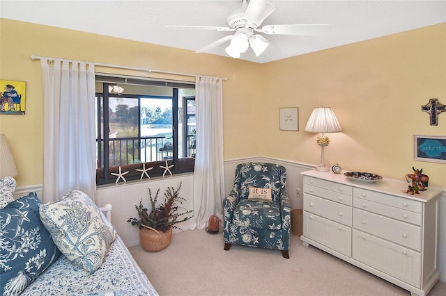 carpeted bedroom featuring access to outside and ceiling fan