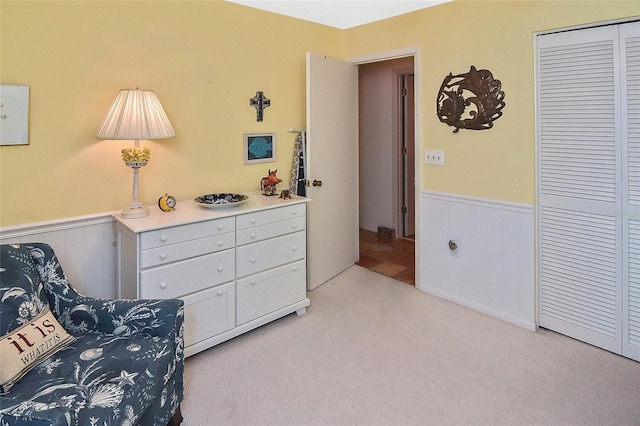 living area with light colored carpet