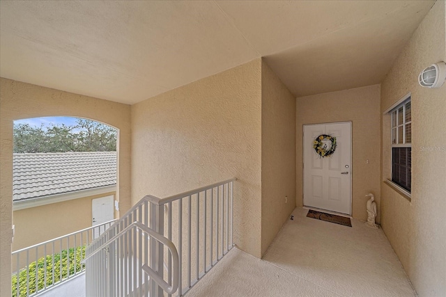 doorway to property featuring a balcony