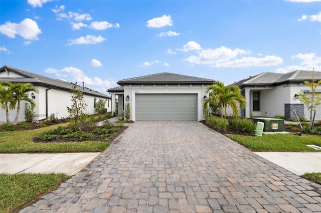 view of front of home with a garage