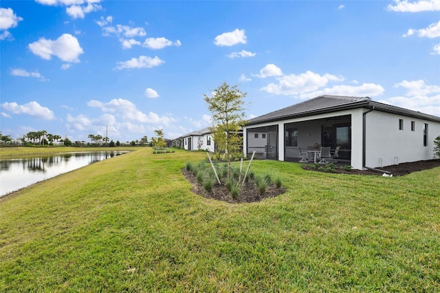 view of yard with a water view