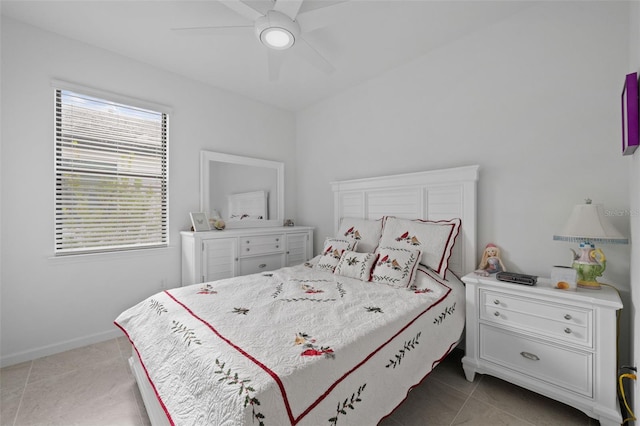 bedroom with light tile patterned flooring and ceiling fan