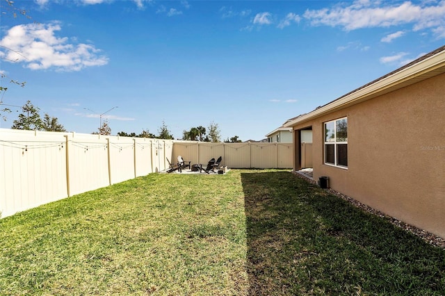 view of yard featuring a fenced backyard and a patio