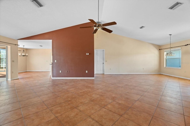 unfurnished living room with ceiling fan with notable chandelier, high vaulted ceiling, and light tile patterned flooring