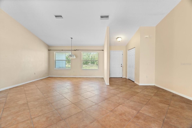 view of tiled spare room