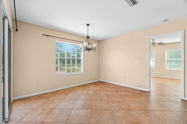 unfurnished dining area featuring light tile patterned flooring and a wealth of natural light