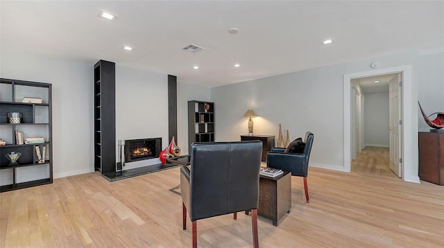 dining space featuring light hardwood / wood-style floors