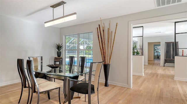 dining area featuring light hardwood / wood-style flooring