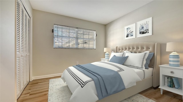 bedroom featuring a closet and light wood-type flooring