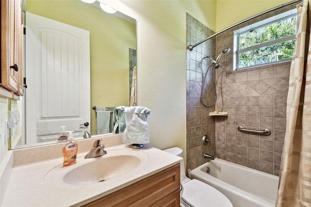 full bathroom with shower / tub combo with curtain, vanity, and toilet