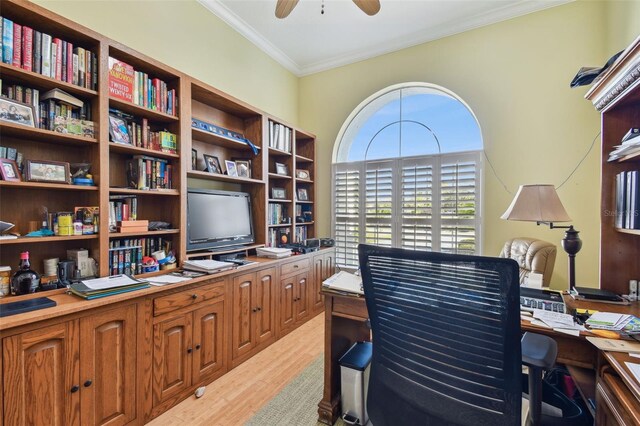 home office with ornamental molding, light hardwood / wood-style floors, and ceiling fan