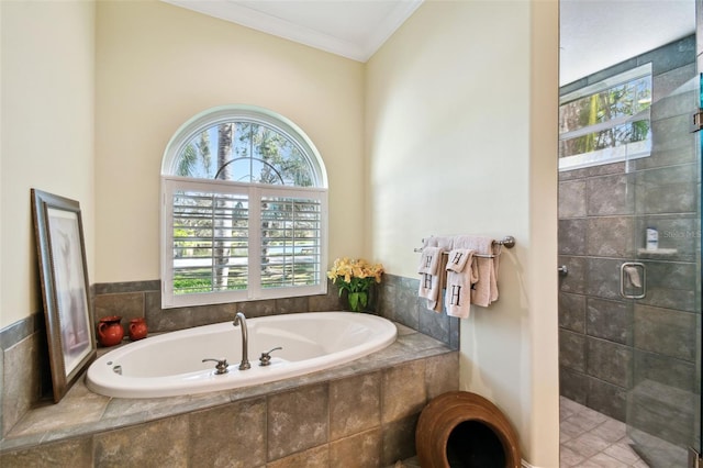 bathroom featuring crown molding and independent shower and bath