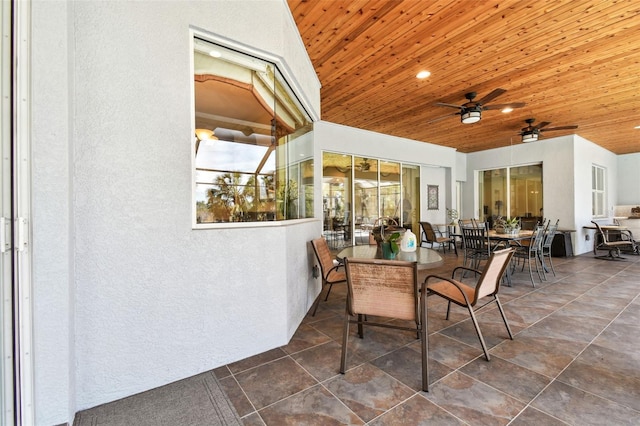 view of patio featuring ceiling fan