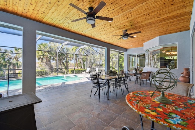 unfurnished sunroom featuring wooden ceiling and a healthy amount of sunlight