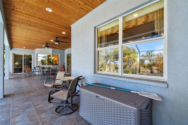 view of patio / terrace featuring ceiling fan