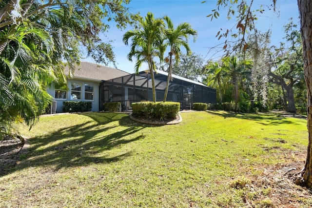 view of yard with a lanai