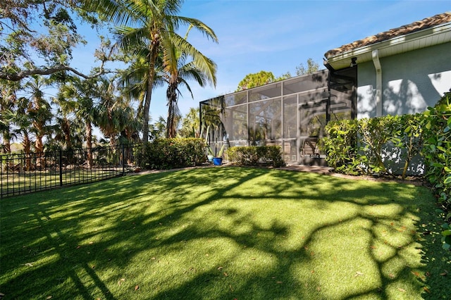 view of yard featuring a lanai