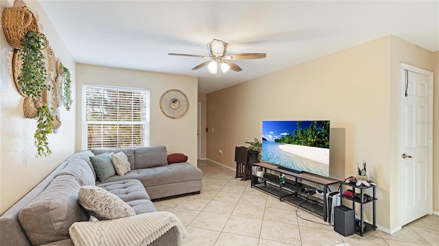 tiled living room with ceiling fan