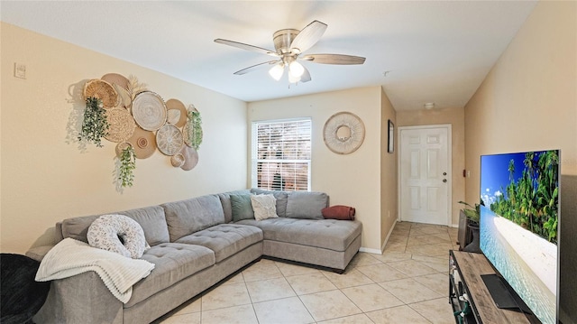 tiled living room with ceiling fan