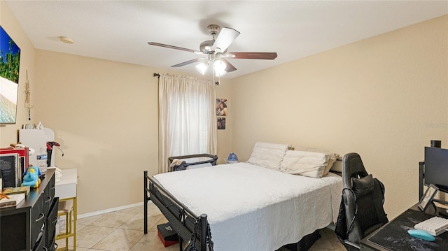 bedroom with light tile patterned flooring and ceiling fan