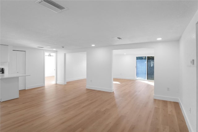 empty room with light wood-type flooring