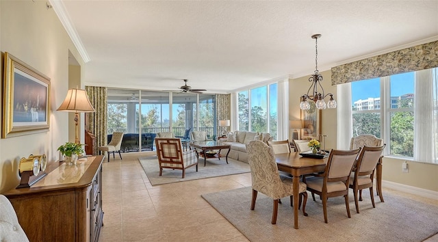 dining space with a wall of windows, light tile patterned floors, a notable chandelier, crown molding, and a textured ceiling