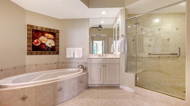 bathroom with vanity, tile patterned flooring, and independent shower and bath