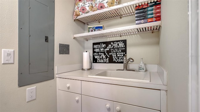 laundry area with sink and electric panel