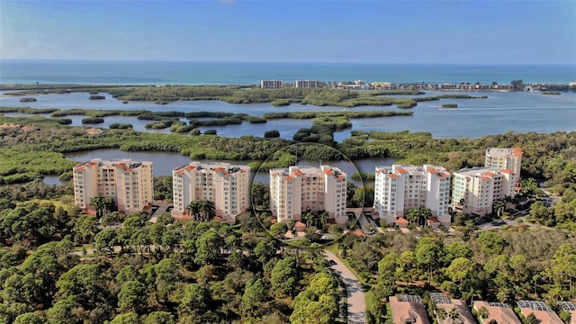 bird's eye view with a water view