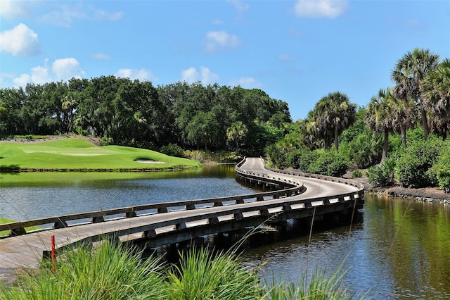 surrounding community featuring a water view